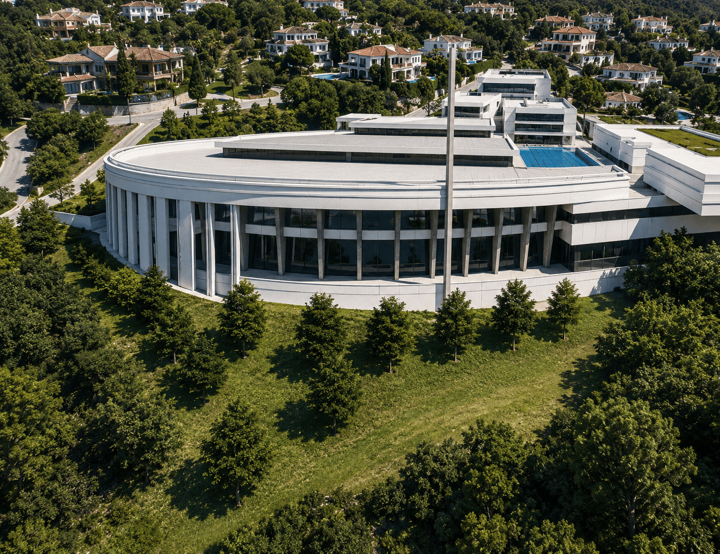 Aerial view of the High Performance Sports Center's natural grass stadium and Olympic-standard athletics track